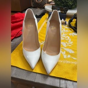 Very gently used Christian Louboutin’s “So Chic” white patent leather heels